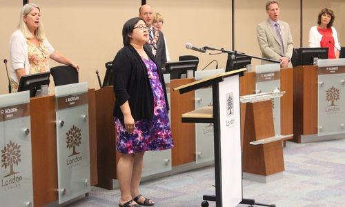 Campus Minister, Conductor/Artistic Director of the King's Chamber Choir sings anthem for London City Council